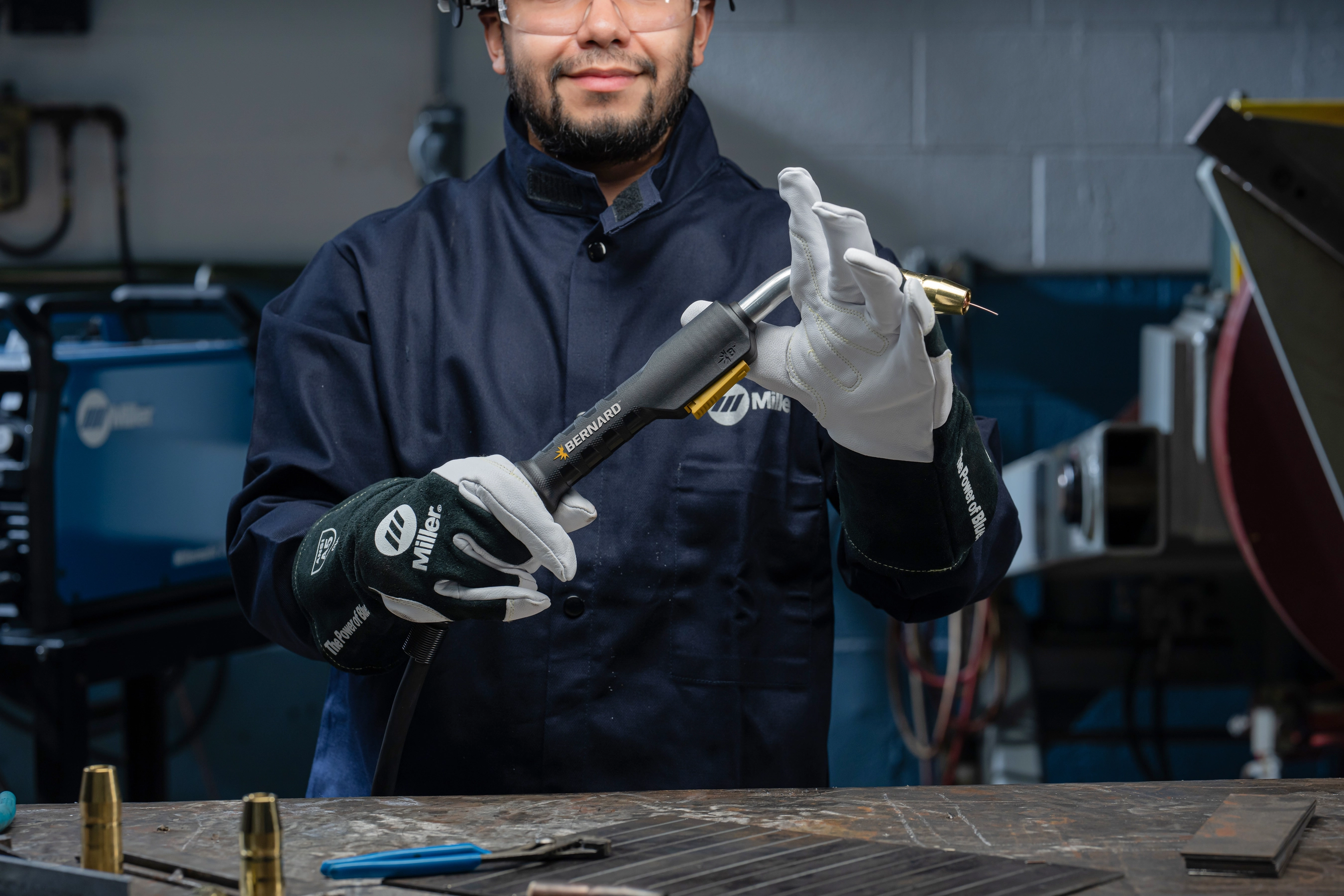 Bernard Wingman MIG gun being held in a shop environment